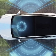 Top-down view of a white autonomous vehicle using lidar and radar technology