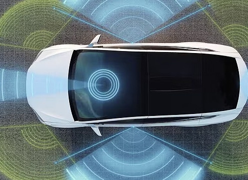Top-down view of a white autonomous vehicle using lidar and radar technology