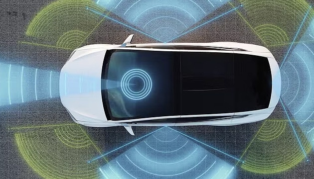 Top-down view of a white autonomous vehicle using lidar and radar technology